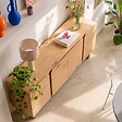 OVIALA - Buffet effet bois 4 portes L 180 cm bois clair - Harlan - vignette