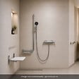 HANSGROHE - Mitigeur thermostatique Ecostat Comfort Care + Barre PMR Unica gauche + Pommeau Pulsify Select + Flexible Designflex - vignette