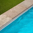 RO'MA NATURE - Margelle de piscine Travertin Beige Nuancé 61x33x3 cm Bord 1/2 Rond (à l'unité) - vignette