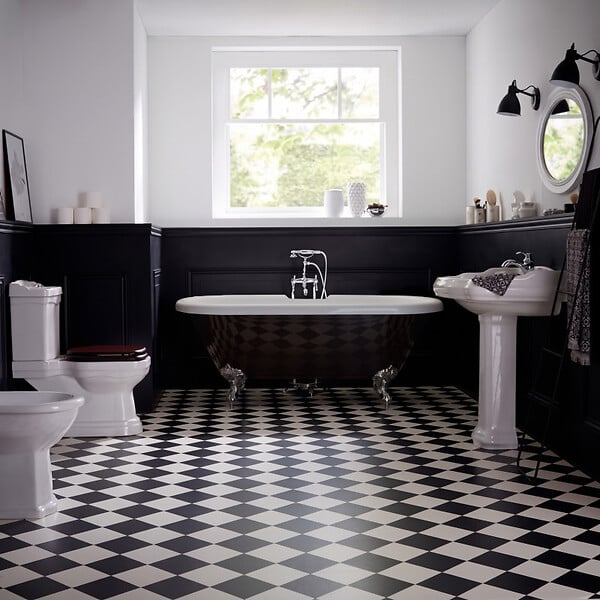 PLANETE BAIN - Baignoire îlot Charly noire avec pieds patte d'aigle chrome - large