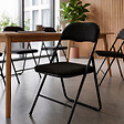 SICAAN - Sicaan Lot de 6 chaises pliantes rembourrées en tissu noir et pieds métal noir - GRETA - vignette