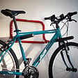 MOTTEZ - Support-vélos mural pour 2 vélos rabattable - vignette
